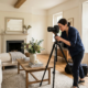 Professional photographer shooting a bright living room interior in an English home
